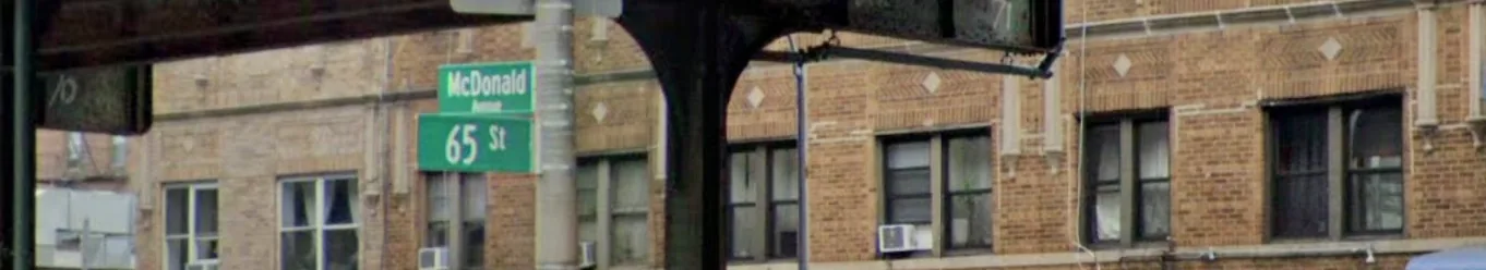 Street signs at the corner of McDonald Avenue and 65th Street, Brooklyn.